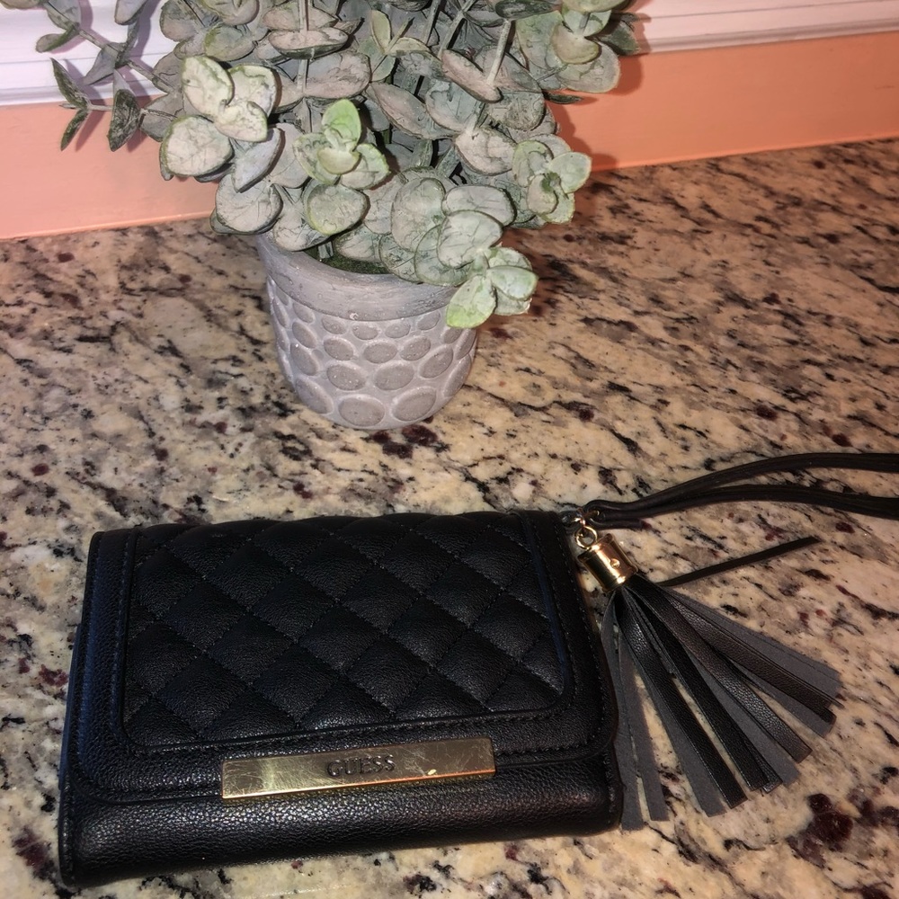 Women’s black GUESS wristlet/wallet